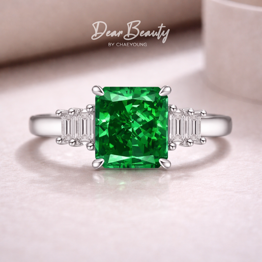 Eleanor 4 Carat Emerald Green Cut Trilogy Ring