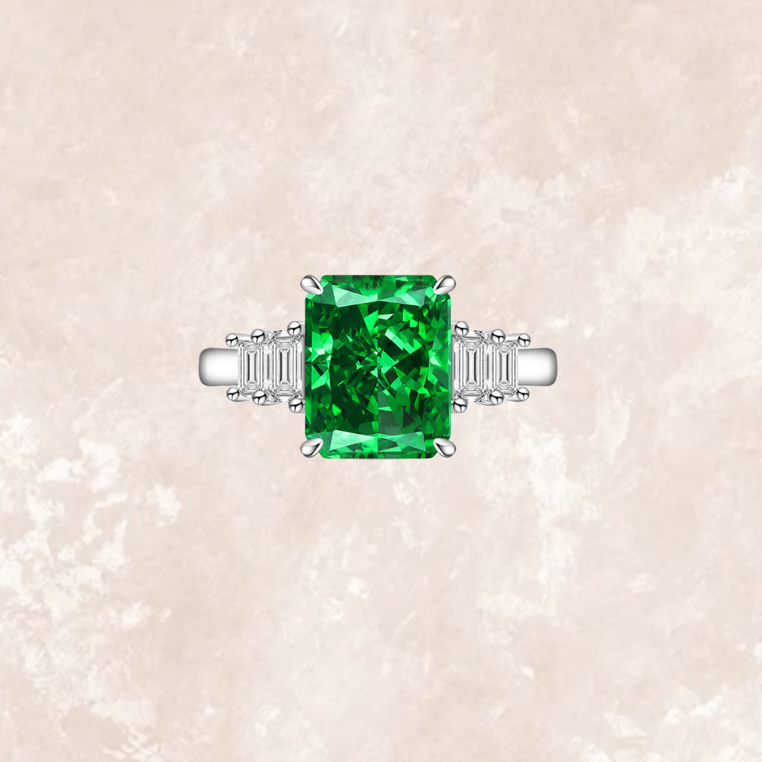 Eleanor 4 Carat Emerald Green Cut Trilogy Ring