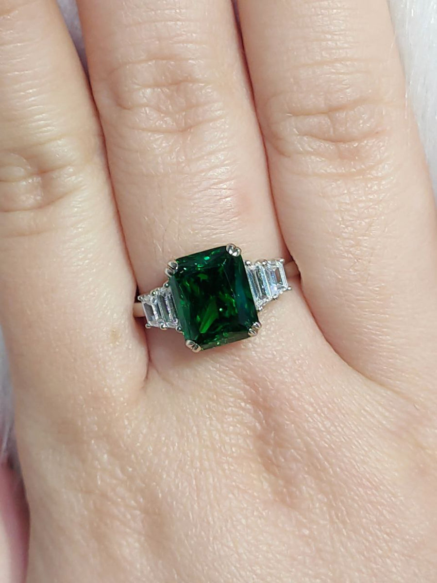 Eleanor 4 Carat Emerald Green Cut Trilogy Ring